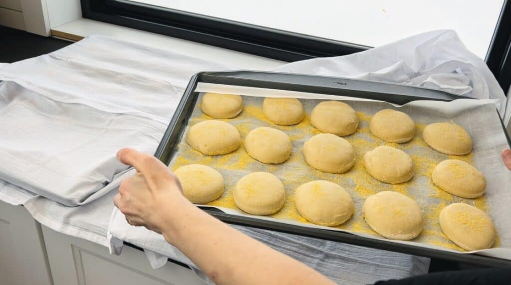 preparing sourdough english muffins ready to bake