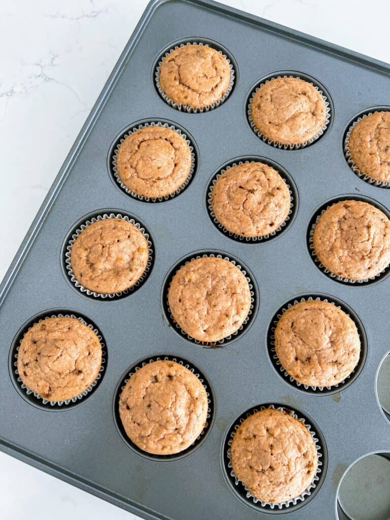strawberries and cream breakfast muffins in a muffin tin