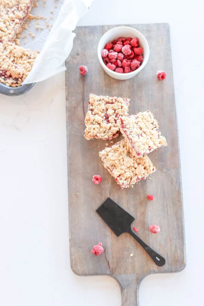 jam bars on a cutting board