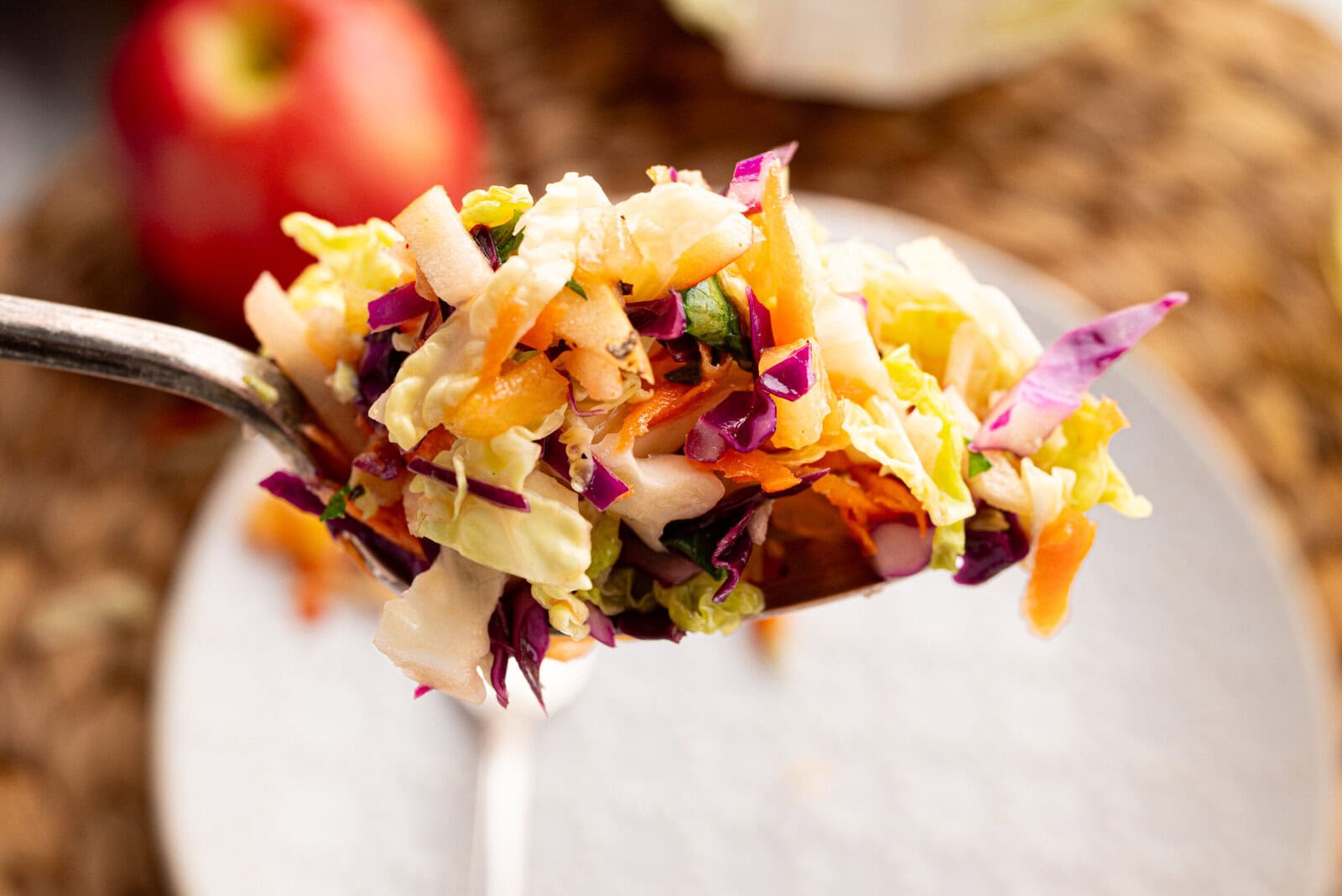 closeup bite of apple pineapple coleslaw