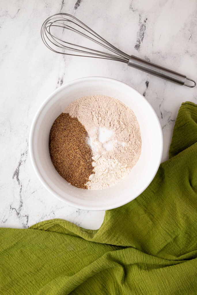 mixing ingredients for sourdough zucchini bread