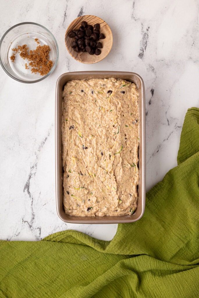 preparing toppings for sourdough zucchini bread