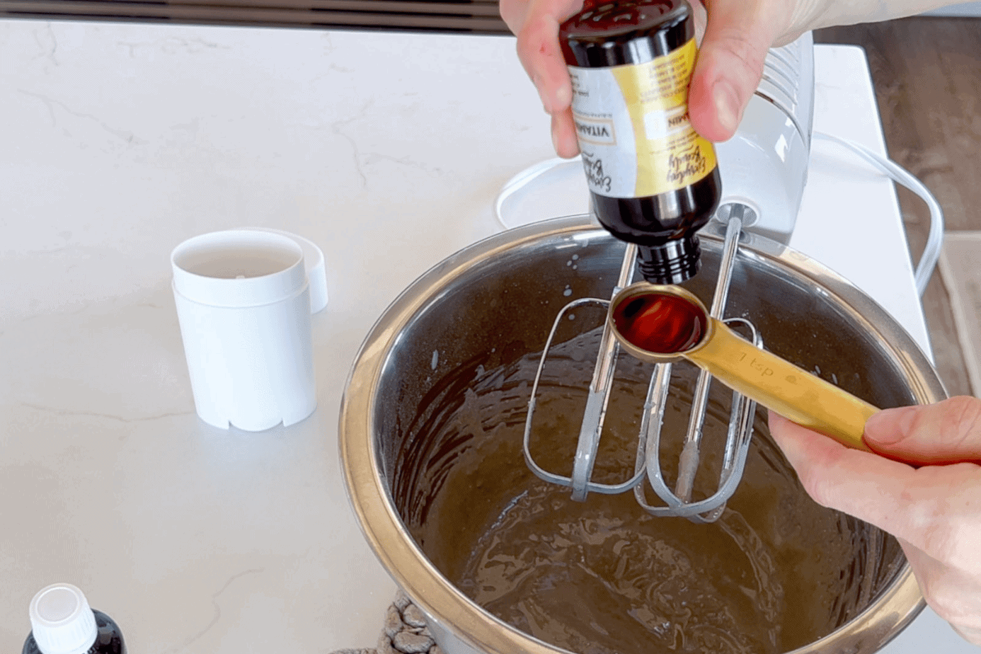 adding ingredients to homemade deodorant recipe
