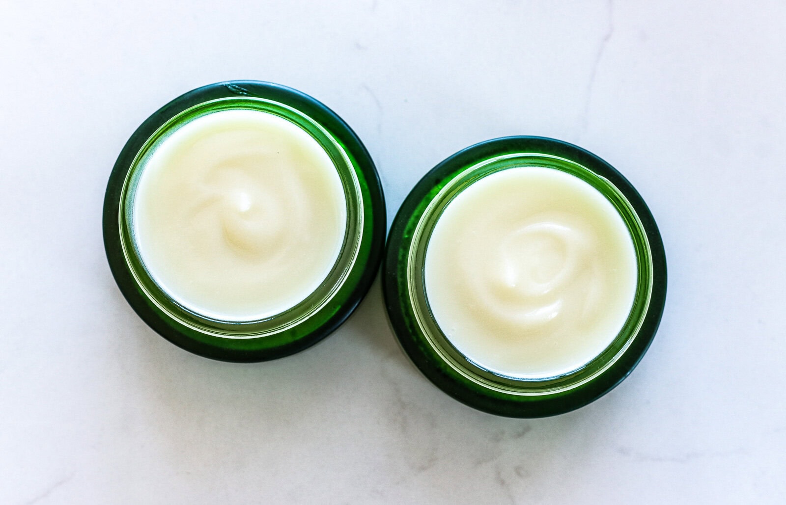 smooth solid homemade tallow balm in a glass jar