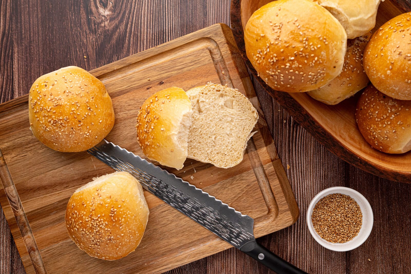sourdough burger buns being sliced